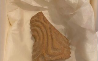 Ancient seal fragment returns home from Sweden after 100 years