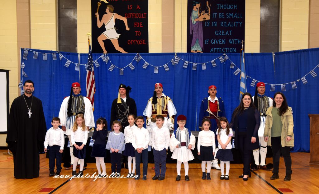 Greek School students and presiding priest of the community Fr, Avgoustinos Psomas posed for a photo with the Evzones, members of the Hellenic Presidential Guard, during their visit to St. Thomas Greek Orthodox Church in Cherry Hill, NJ, on March 30. (Photo: Steve Lambrou)