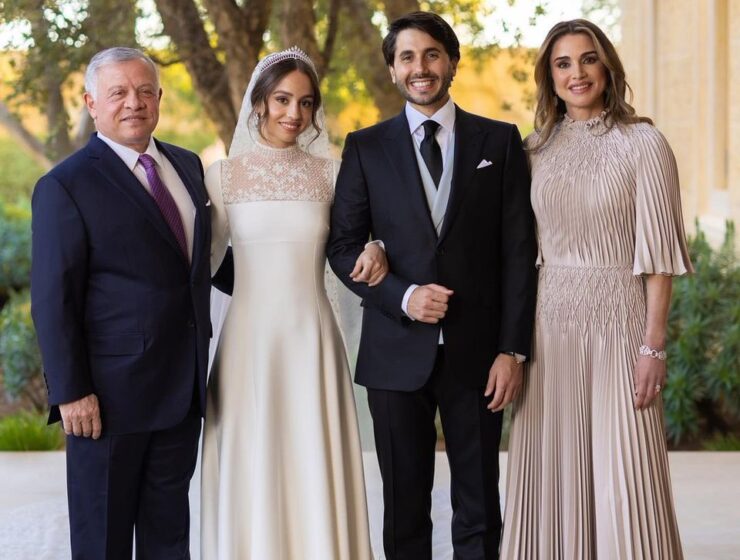 Princess Iman and Jameel Thermiotis alongside King Abdullah and Queen Rania in Their Official Wedding Portrait. Princess Iman in Dior Wedding Dress which featured a Full Skirt and a Sheer Lace Panel and Lace-Cuffed Sleeves. Chaumet Diamond Tiara owned by her Grandmother.