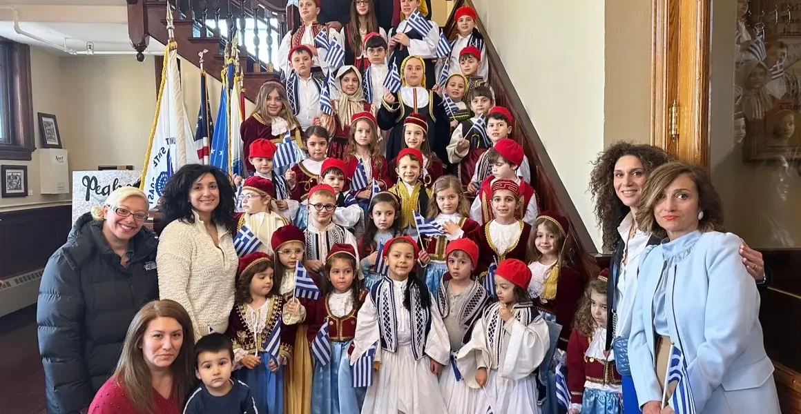 Students and staff at the St. Vasilios Greek School were at Peabody City Hall on Wednesday for a Greek flag-raising ceremony with Mayor Ted Bettencourt to honor Greek Independence Day. (Dina Kalaitzidis)