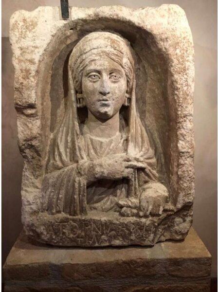 This picture made available by the Carabinieri Command for the Protection of Cultural Heritage on Friday, April 28, 2023, shows a funerary stele, conventionally referred to as "Bride of the Desert" and illegally excavated in the ancient Roman archaelogical site of Zeugma in eastern Turkey. The stele had been illicitly exported from Turkey and Italian Carabinieri sized it in a private house near Florence in central Italy.