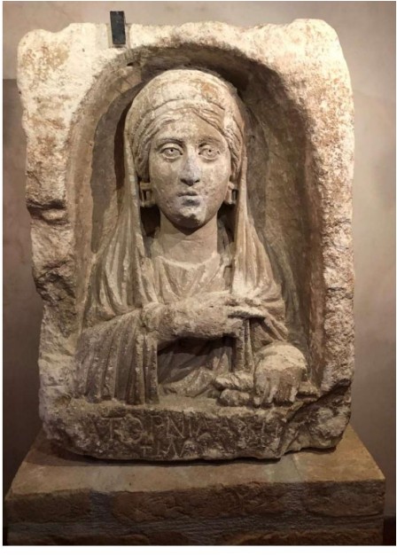This picture made available by the Carabinieri Command for the Protection of Cultural Heritage on Friday, April 28, 2023, shows a funerary stele, conventionally referred to as "Bride of the Desert" and illegally excavated in the ancient Roman archaelogical site of Zeugma in eastern Turkey. The stele had been illicitly exported from Turkey and Italian Carabinieri sized it in a private house near Florence in central Italy.