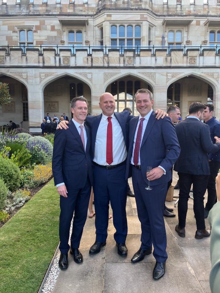 Premier Chris Minns (L) with Steve Kamper (far right) and his brother Bill Kamper (centre) NSW Parliament