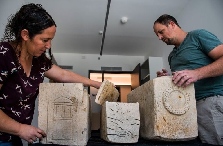 Israeli archaeologists retrieve 1850-year-old stone ossuaries with Greek writing