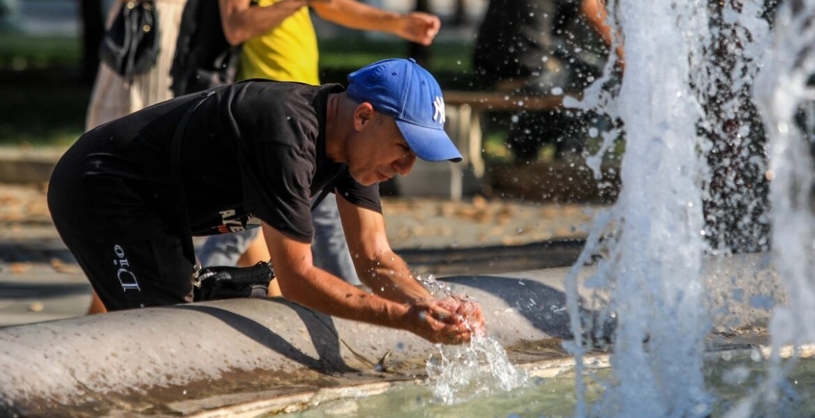 greece heatwave fountain july 2024