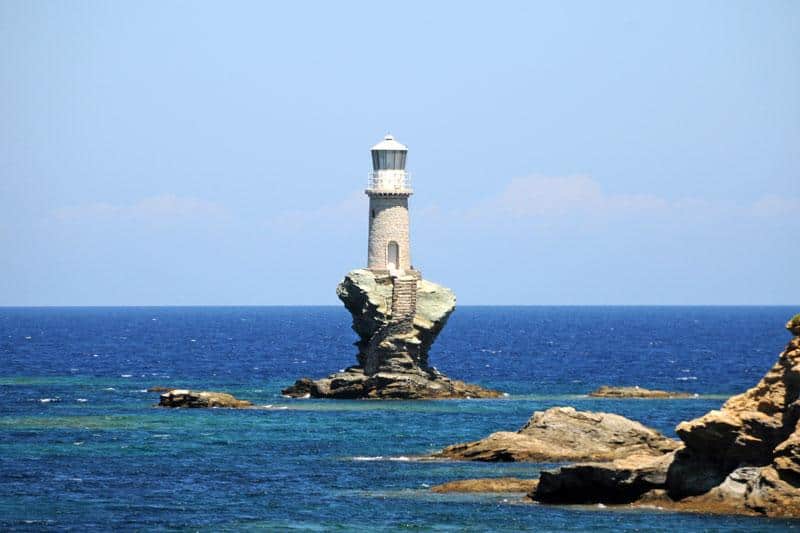 The lighthouse on the small island of Dysvato, in the Andros-Tinos Strait