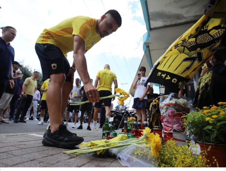 Flowers, candles, scarves, cans of beer laid in memory of 29-year-old Michalis K. who was stabbed to death outside the AEK Football Club Arena in the Athenian suburb of Nea Philadelphia.