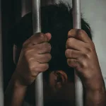 Pakistani handcuff arrested Rhodes