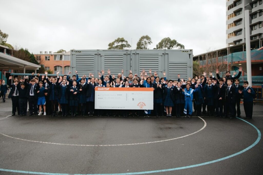 AFL Team – GWS Giants also made a donation to the Changemakers project. Photo: Chris Spyrou.