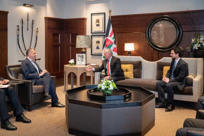 Jordan’s King Abdullah and Crown Prince Hussein bin Abdullah with Greek Foreign Minister Giorgos Gerapetritis. (Petra)