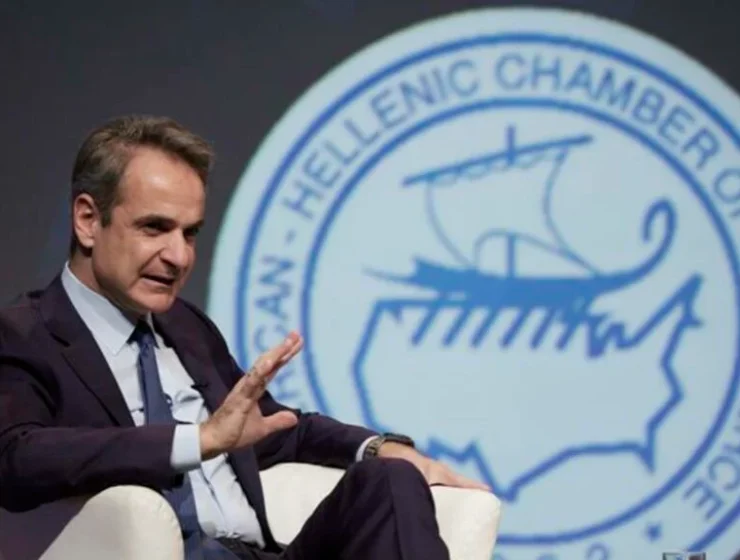 Prime Minister Kyriakos Mitsotakis talks with the President of the Hellenic American Chamber of Commerce, Nikolaos Bakatselos (not pictured), during an event of the Chamber titled "Fostering a Sustainable Economic Future Amidst Global Challenges," at the Athens Concert Hall. Photo: AMNA/PRIME MINISTER'S PRESS OFFICE/DIMITRIS PAPAMITSOS
