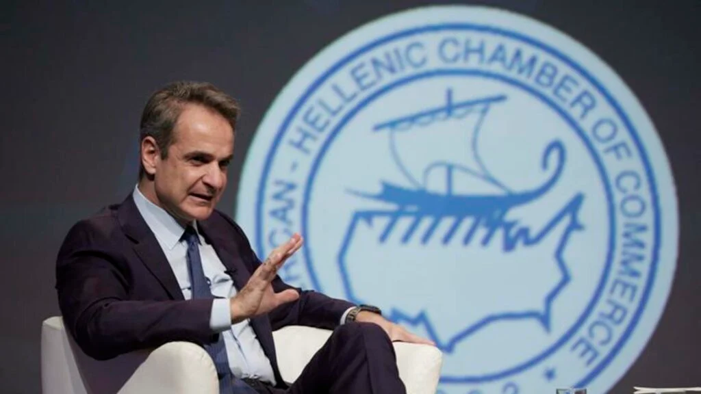 Prime Minister Kyriakos Mitsotakis talks with the President of the Hellenic American Chamber of Commerce, Nikolaos Bakatselos (not pictured), during an event of the Chamber titled "Fostering a Sustainable Economic Future Amidst Global Challenges," at the Athens Concert Hall. Photo: AMNA/PRIME MINISTER'S PRESS OFFICE/DIMITRIS PAPAMITSOS