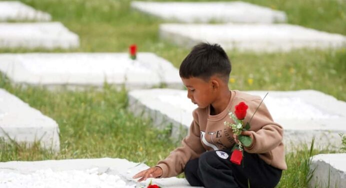 Volunteers on Greek Island Transform Burial Sites into Memorial for Refugees
