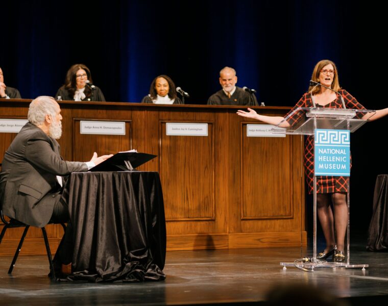 2_Prosecution attorney Julie Porter (right) questions Socrates (seated), played by Second City alum John Kapelos, at the National Hellenic Museum's The Trial of Socrates_Image courtesy of the museum