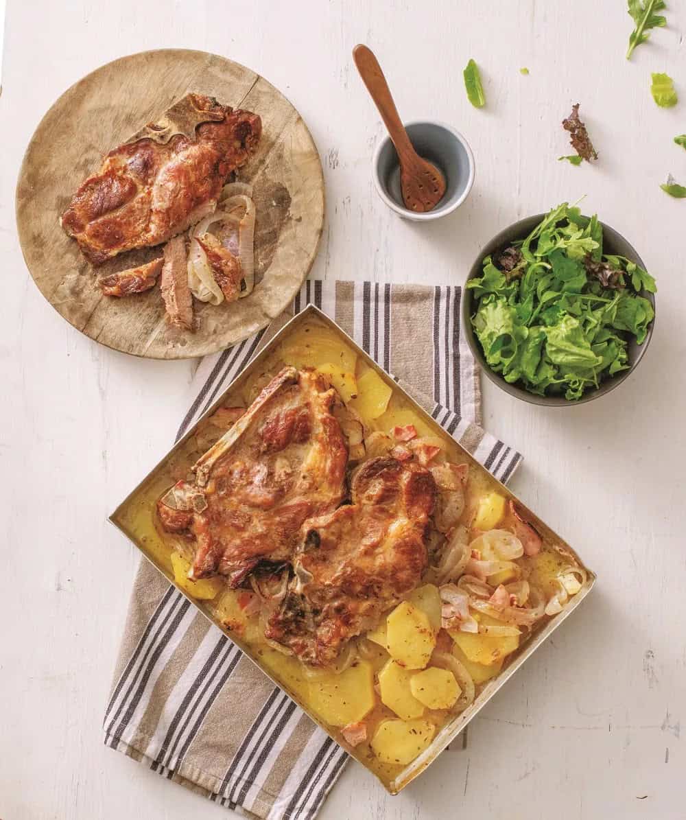 Baked pork chops with potatoes and bacon