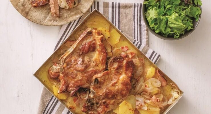 Baked pork chops with potatoes and bacon