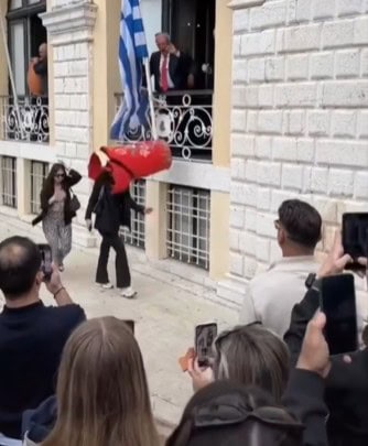 Woman Injured by Falling Bottle During Corfu's Holy Saturday Festivities