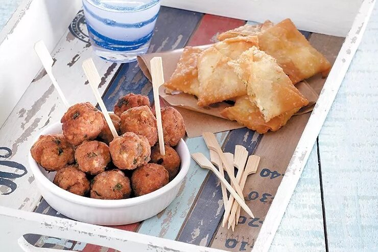 Keftedes flavoured with ouzo and Mytilene giouzlemedes (Fried cheese pies)