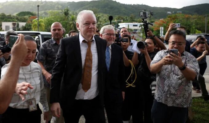 Julian Assange has formally entered a guilty plea for violating the Espionage Act. Sitting calmly with folded hands, Assange waived his right to indictment by a grand jury before Chief Judge Ramona V. Manglona. Judge Manglona quipped, "Not every case goes this fast," lightening the mood briefly