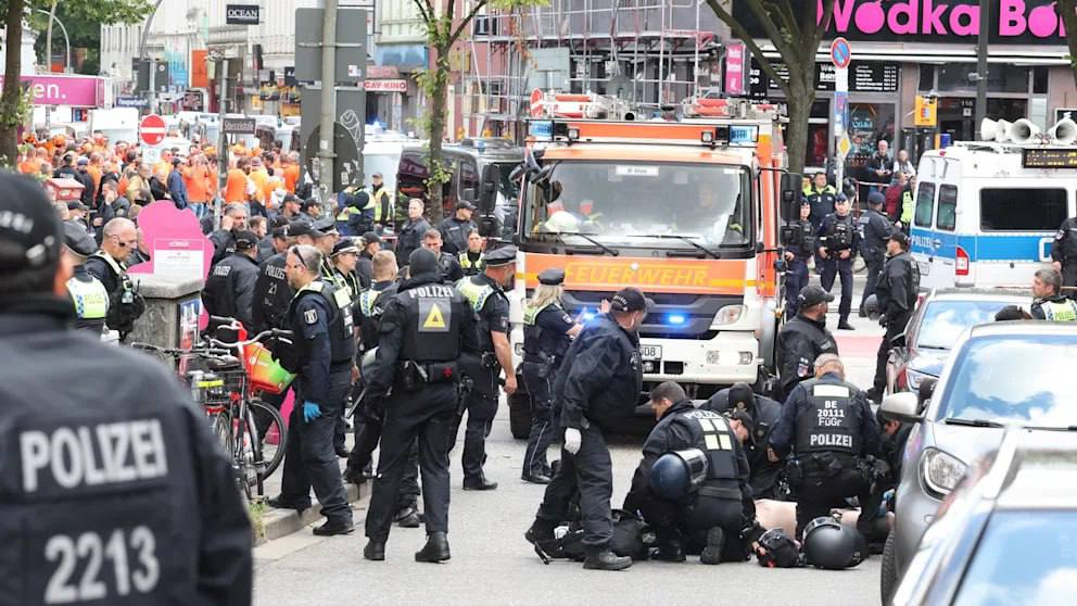 German Police have shot a man armed with an axe near Euros fan park in Hamburg before Poland vs Netherlands