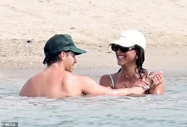 Joe Jonas and Laila in water