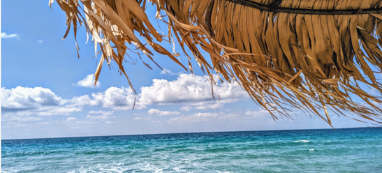 Photo looking out to the crystal blue sea. IMAGE: ©2025 Travel Mazi Mou/Krystina Kalapothakos