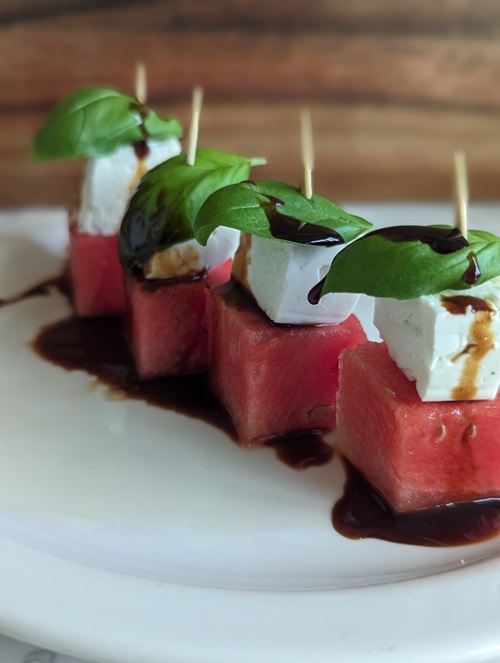 Skewers of watermelon, feta, and basil. IMAGE: ©2025 Travel Mazi Mou/Krystina Kalapothakos