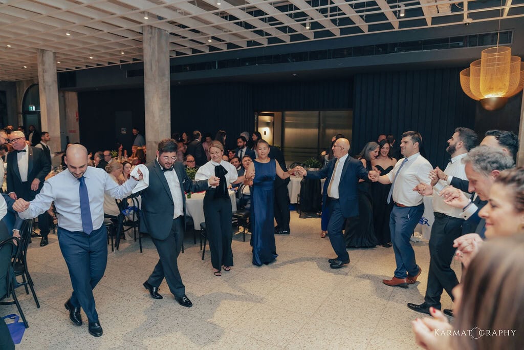 Guests dancing at Greek-Australian Society anniversary event