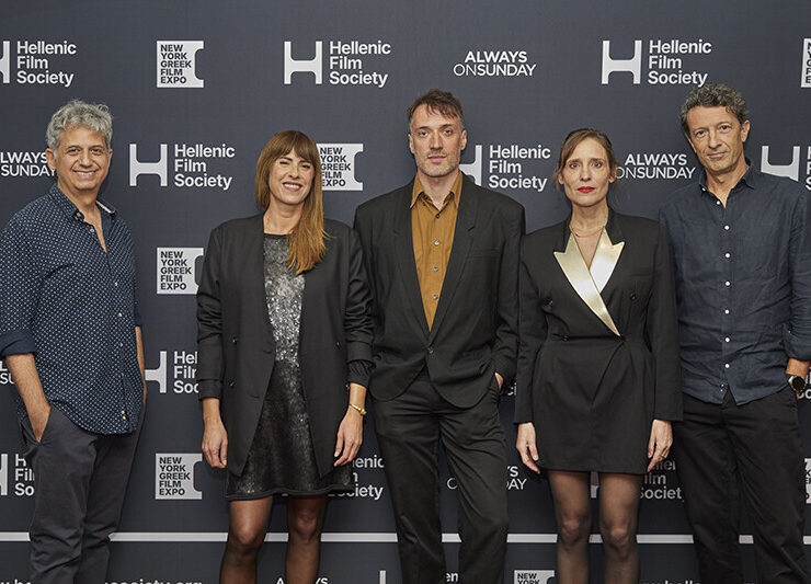 Three men and 2 women pose on the red carpet at New York Greek Film Expo. Actors and directors on Opening Night at the New York Greek Film Expo