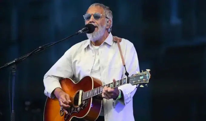 British–Greek Cypriot singer Yusuf/Cat Stevens has cancelled his North American book tour after his US visa was denied. Born Steven Demetre Georgiou to a Greek Cypriot father and Swedish mother, the legendary musician expressed disappointment over the cancellation as visa approval remains uncertain.